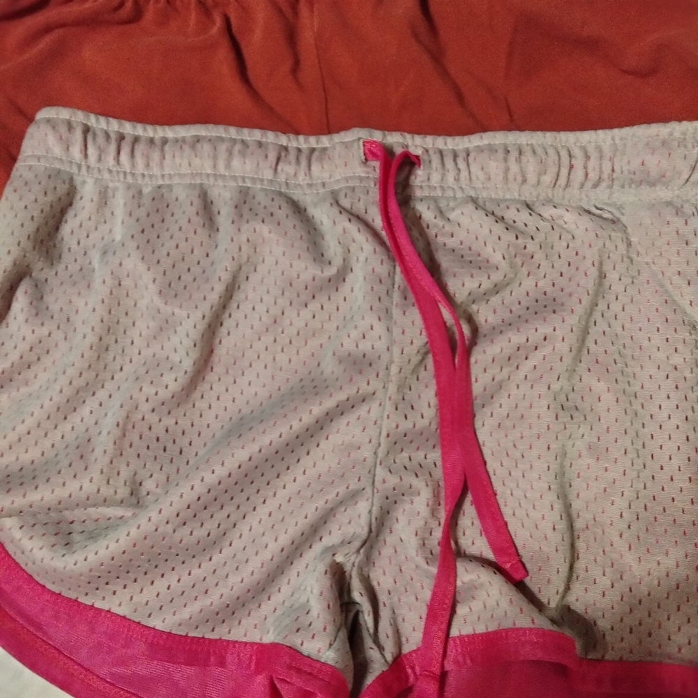 Bundle of comfy lounge shorts. Both extra large and super comfy. Pink gray red